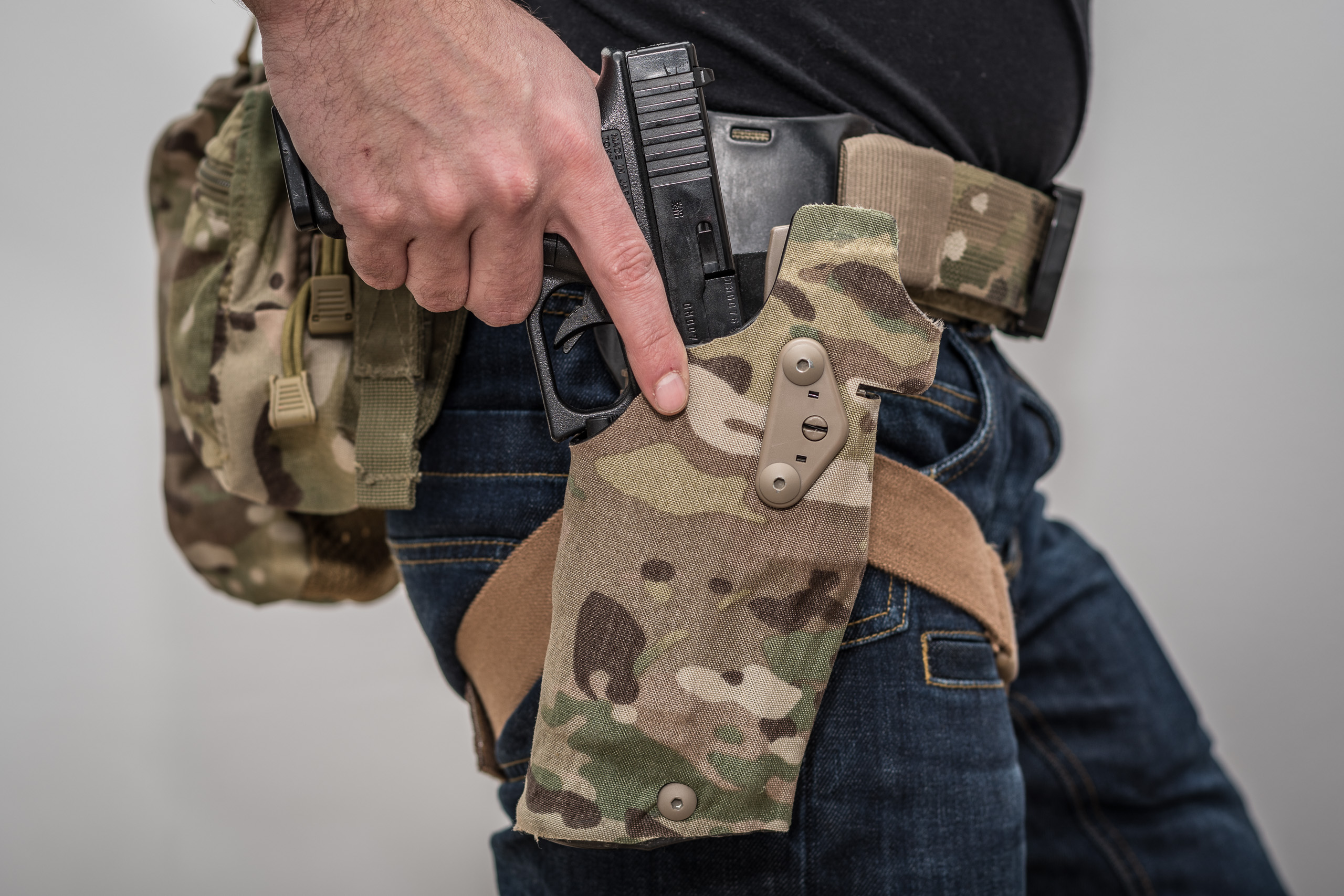 TMC 354DO ALS drawing the weapon